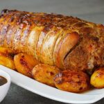 Lomo de cerdo relleno al horno con patatas